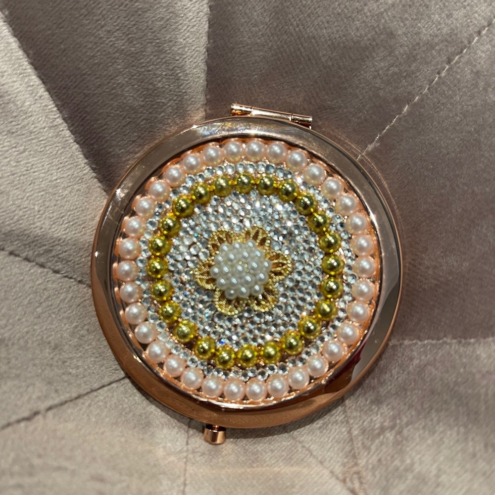 Rose gold compact mirror